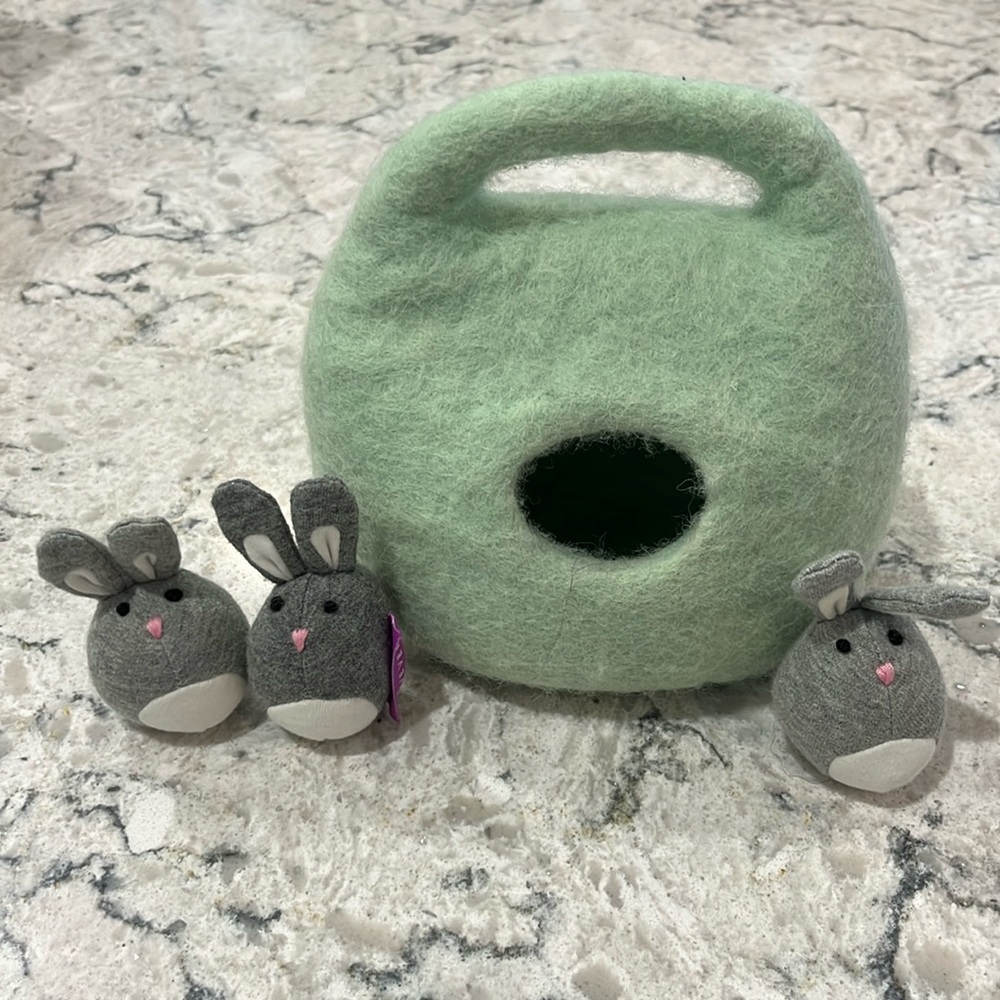 Lovevery Bunnies in a felt burrow